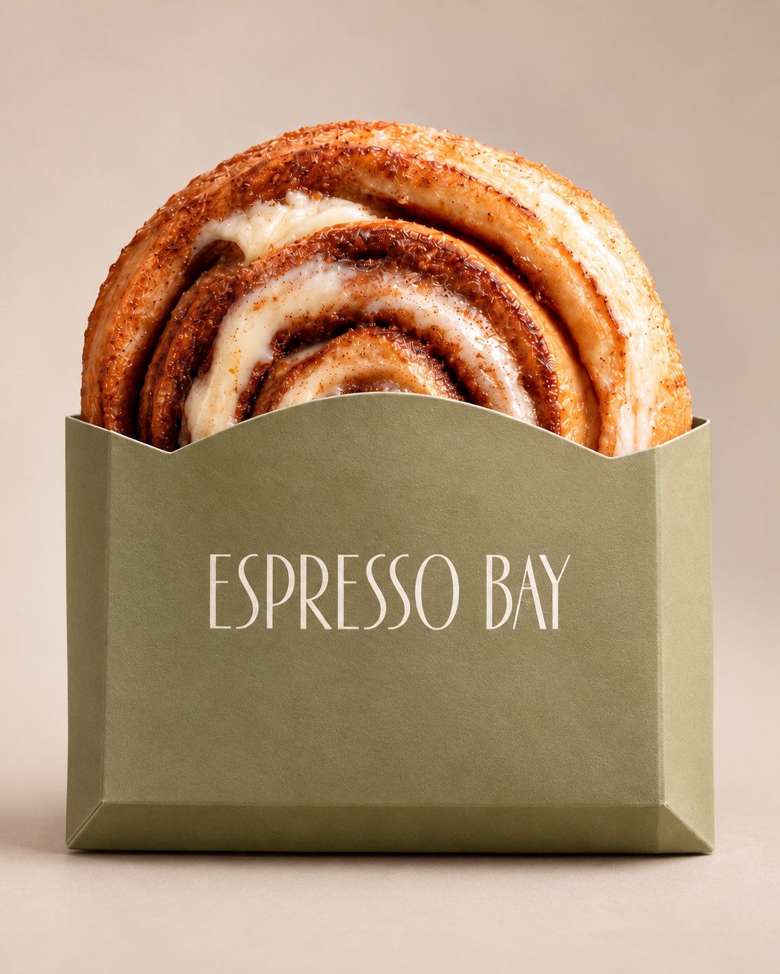 Cinnamon bun in een olijfgroene Espresso Bay-verpakking